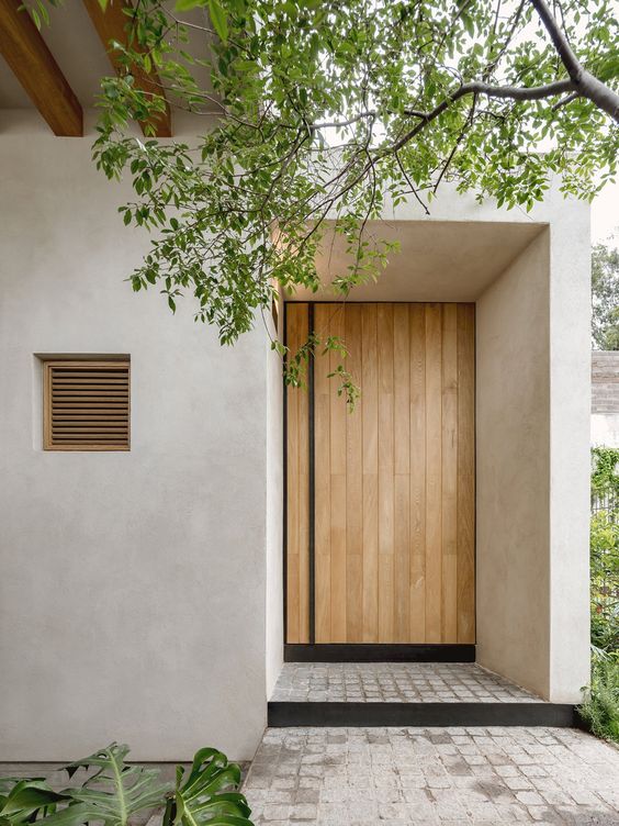 puertas de entradas modernas de madera para casas pequenas