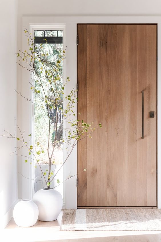 puertas de entradas simples de madera para casas pequenas