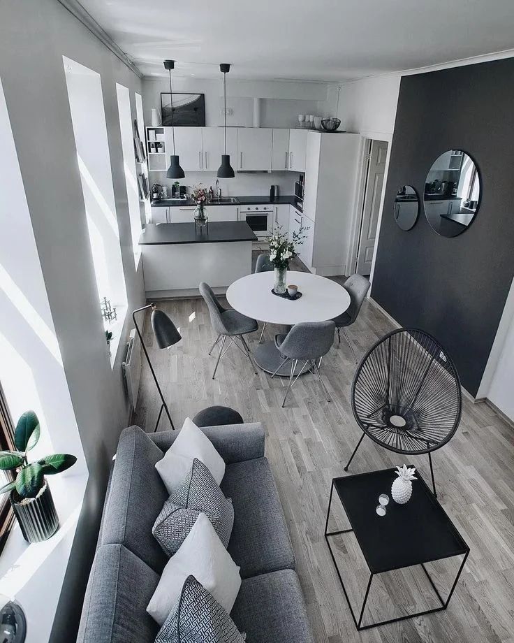 Cocina pequeña con barra moderna al living comedor