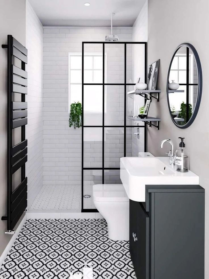 baño pequeño en blanco y negro ducha con mampara vidrios repartidos