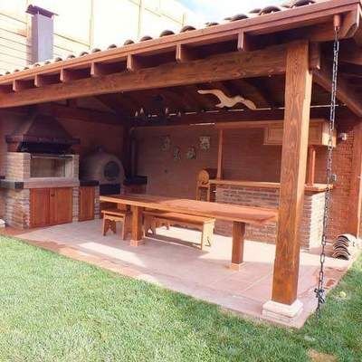 quincho pequeño estilo rustico con ladrilllo a la vista